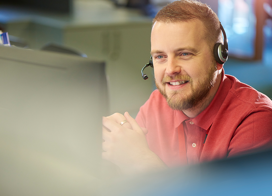 Professional at work wearing headset