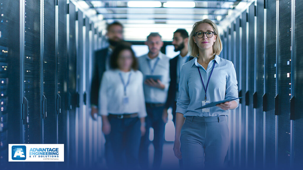 Professionals walking through data center