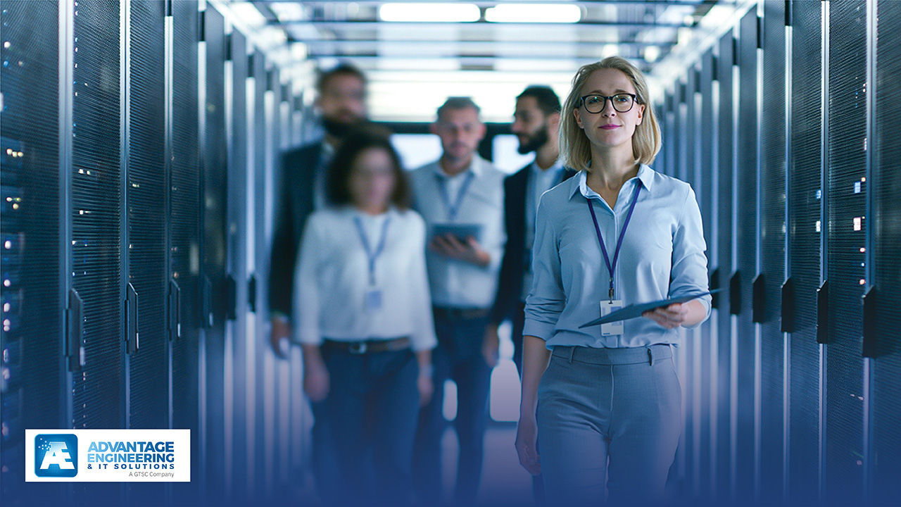 Professionals walking through data center